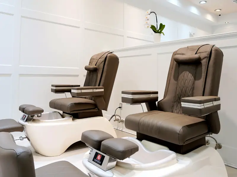 Pedicure thrones in the bright pedicure room, second view